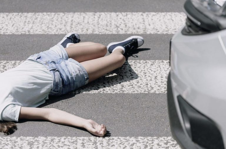 Pedestrian struck by vehicle in crosswalk